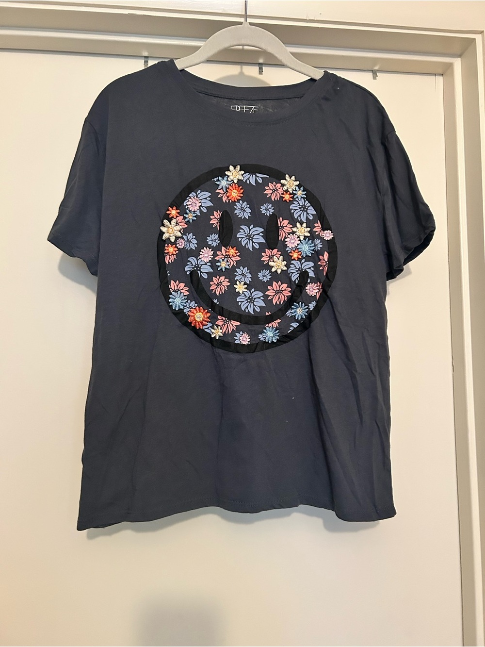 NWT Freeze Navy Graphic Tee with Floral Smiley Applique